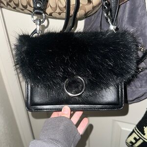 Black furry Rebecca minkoff crossbody bag